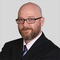 Author headshot Dan Baker