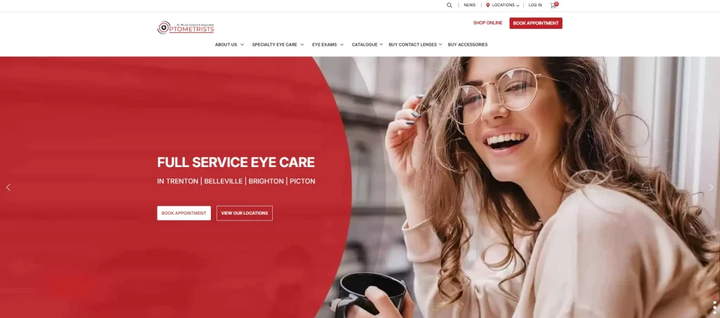 Homepage banner of an optometry website showing a smiling woman wearing round eyeglasses and holding a coffee cup, with a red overlay and the text “Full Service Eye Care in Trenton | Belleville | Brighton | Picton” alongside “Book Appointment” and “View Our Locations” buttons.